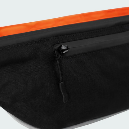 Anti-Diebstahl-Fach der vvelo Crossbag (Orange, Small)